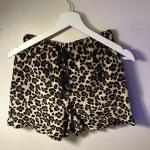 Leopard print fuzzy sleep shorts with black ties for a bow 🎀